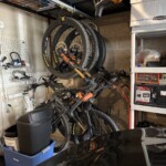 Close up of bikes hanging under spider racks using GearBlocks swivel hooks.